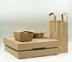 A stack of cardboard boxes, bowls, and a paper bag