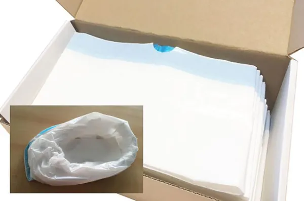 Commode liner with superabsorbent pad