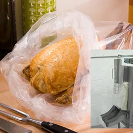 Chicken bagging machine