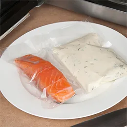 Multi compartment steam cooking bags