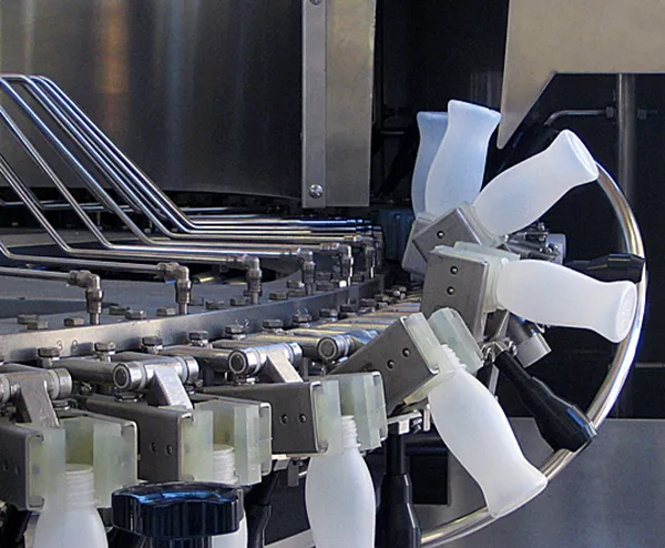 CONTAINER RINSERS AND CONTAINER SANITIZERS