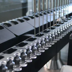 Vial processing machines