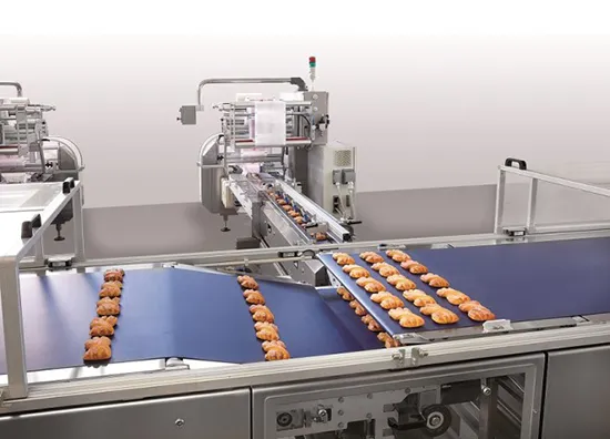 Flow wrapping machines
