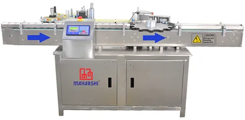 WRAPAROUND LABELLING MACHINE WITH STAR WHEEL