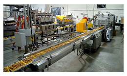 Very Quickly Tray Loading and Shrink Wrapping Cracklin Snacks