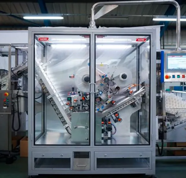 AUTOMATIC TUBE LABELING MACHINE