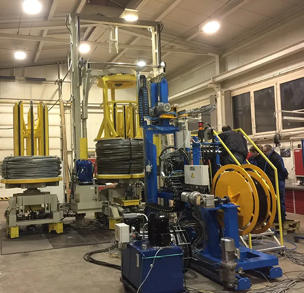 AUTOMATIC STRAPPING SOLUTIONS FOR DIFFERENT TYPES OF WIRE COILS