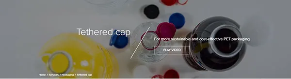 Tethered cap