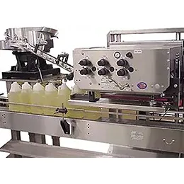 SPINDLE CAPPER