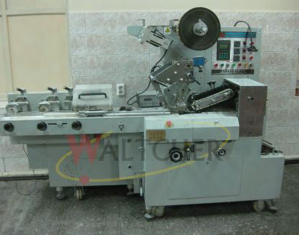 Cuting and wrapping machine