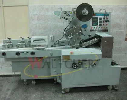 Cuting and wrapping machine